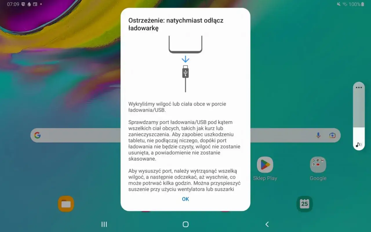 Ostrzeżenie o wilgoci w porcie ładowania Samsung. Aby wyłączyć czujnik wilgoci, odłącz ładowarkę i poczekaj, aż port wyschnie.