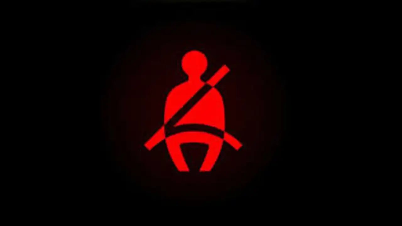 Icono rojo de cinturón de seguridad encendido. Recuerda la importancia de la seguridad al volante.