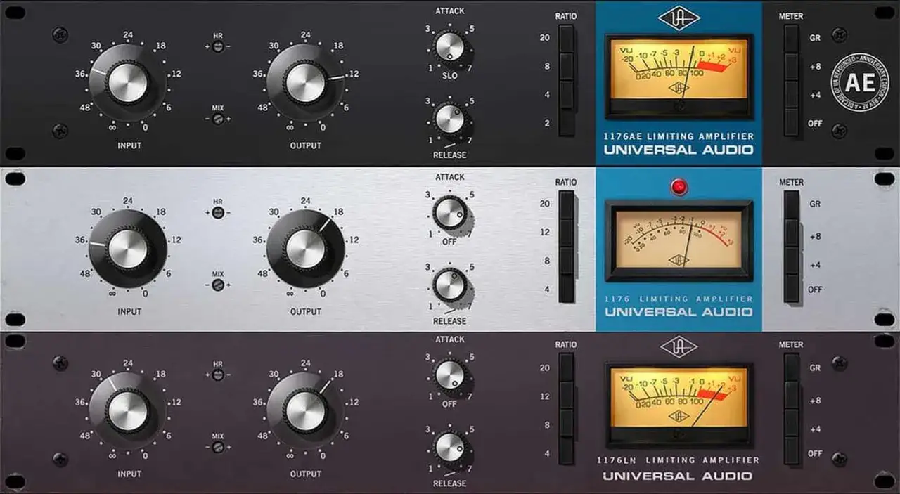 Trois compresseurs cla 76 Universal Audio, un noir, un argent&eacute; et un bleu, avec leurs VU-m&egrave;tres.