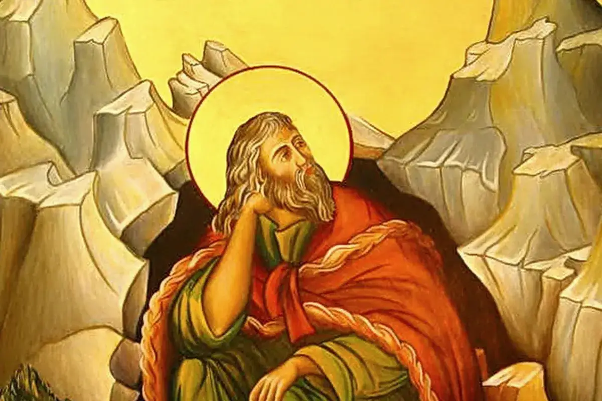 Ikona biblijna przedstawia proroka Eliasza w górach, zamyślonego, z aureolą.
