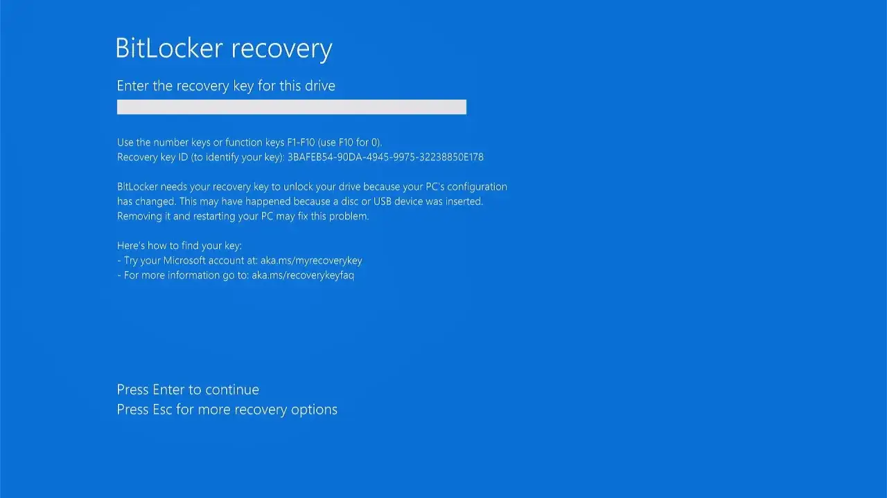 Ekran odzyskiwania BitLocker. Wpisz klucz odzyskiwania, aby odblokować dysk. ID klucza: 3BAFEB54-90DA-4945-9975-32238850E178.