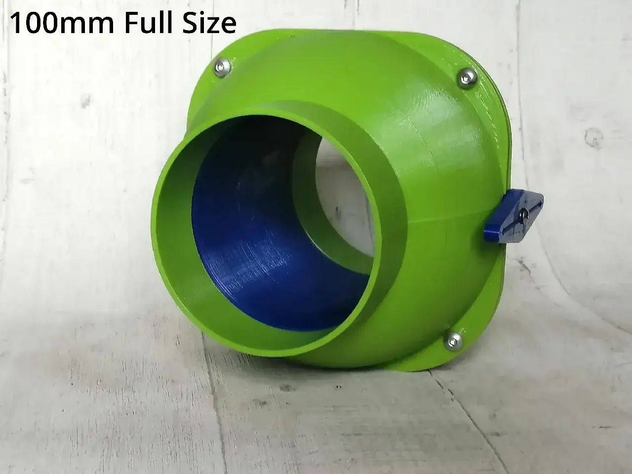 A bright green 3D printed blast gate with a blue interior and a blue lever. This 100mm blast gate is ready to control airflow.