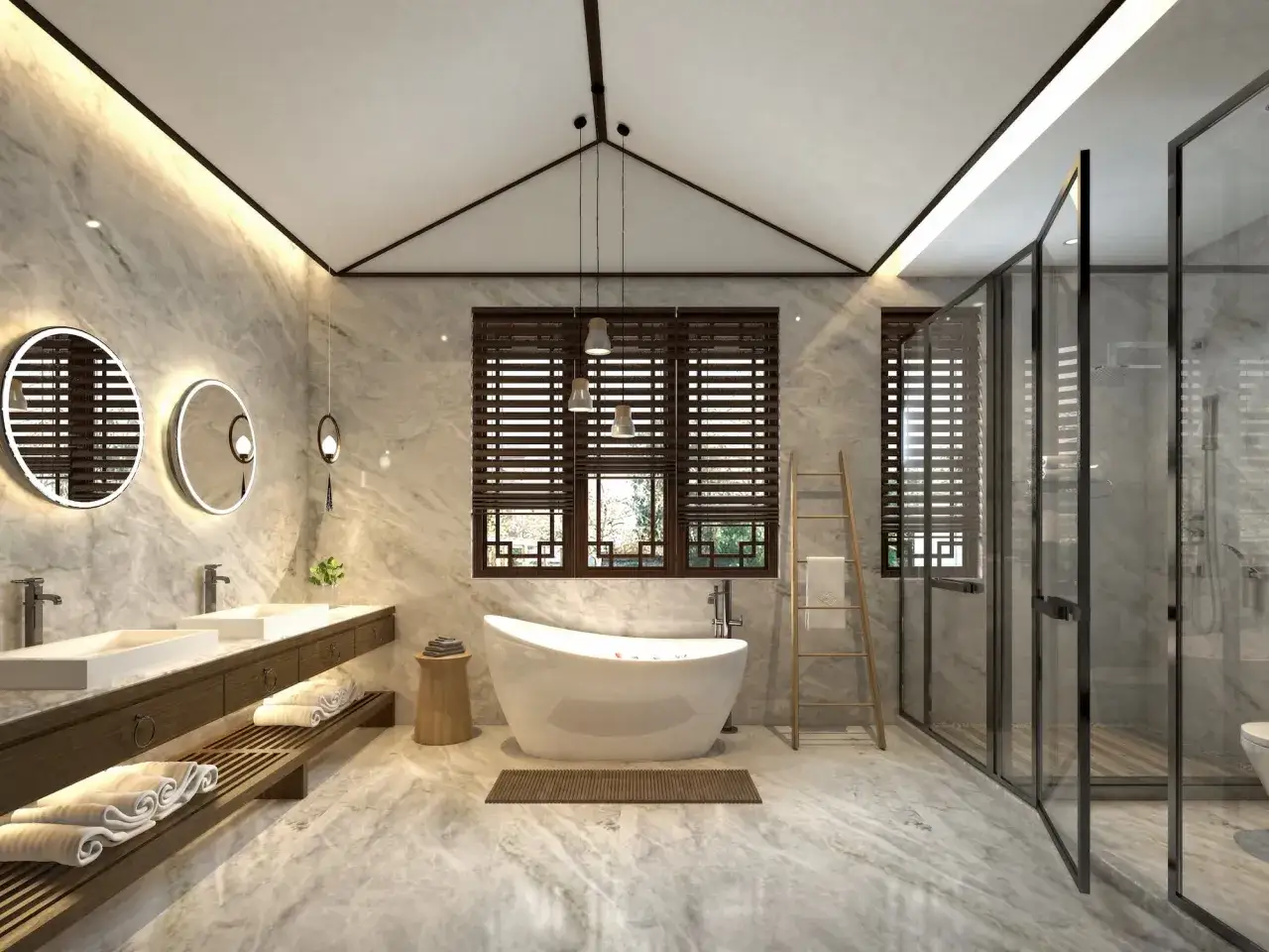 Une **salle de bain intemporelle** avec une baignoire &icirc;lot, une douche vitr&eacute;e, un double lavabo et des finitions en marbre.