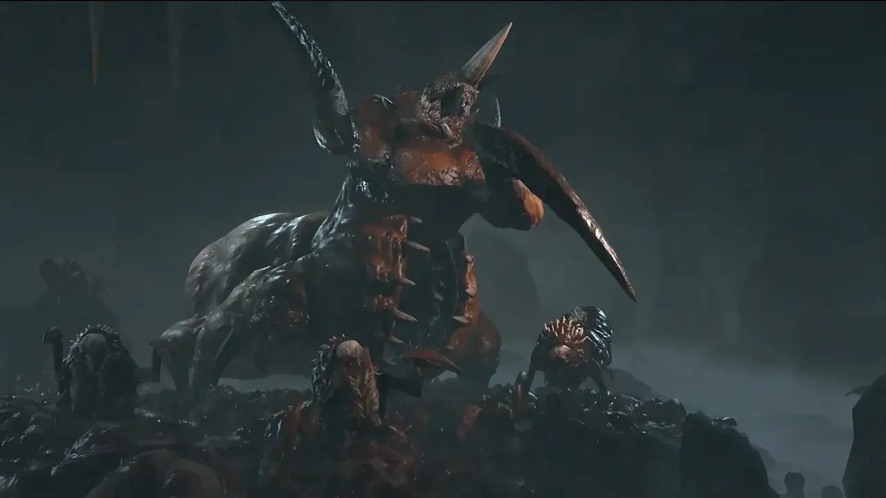 Potężny Duriel z Diablo 4, otoczony mniejszymi potworami, czai się w mrocznej jaskini.