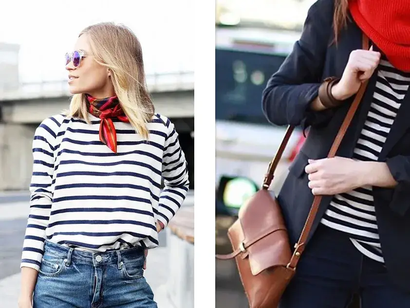 Frau trägt klassisches Breton-Shirt mit Jeans in Paris