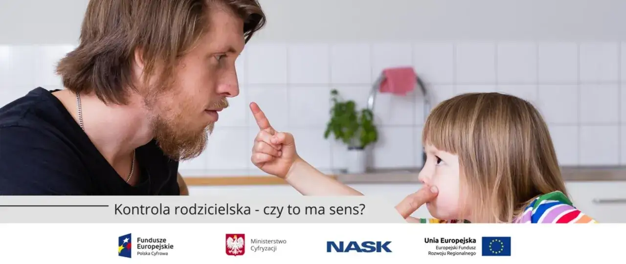 Ojciec poucza dziecko, przypominając o zasadach bezpiecznego korzystania z internetu dla dzieci.