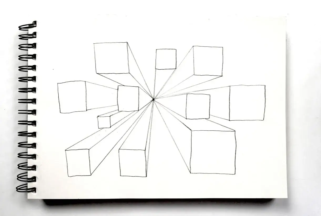 Dessin de cubes en perspective, montrant un point de fuite central. Ce type de perspective donne une impression de profondeur.