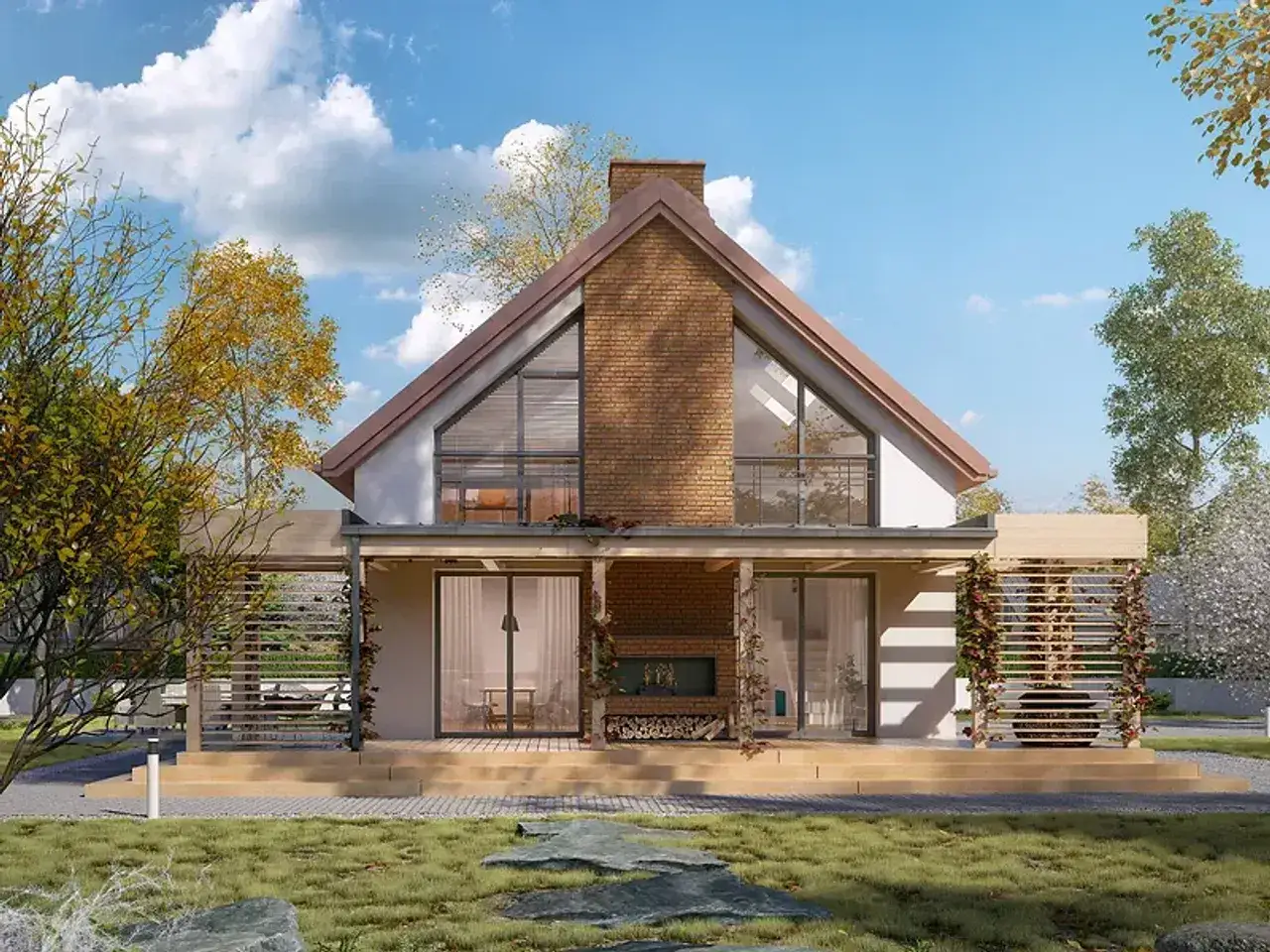 Nowoczesny bungalow z dużymi oknami i drewnianą werandą, otoczony jesienną zielenią.