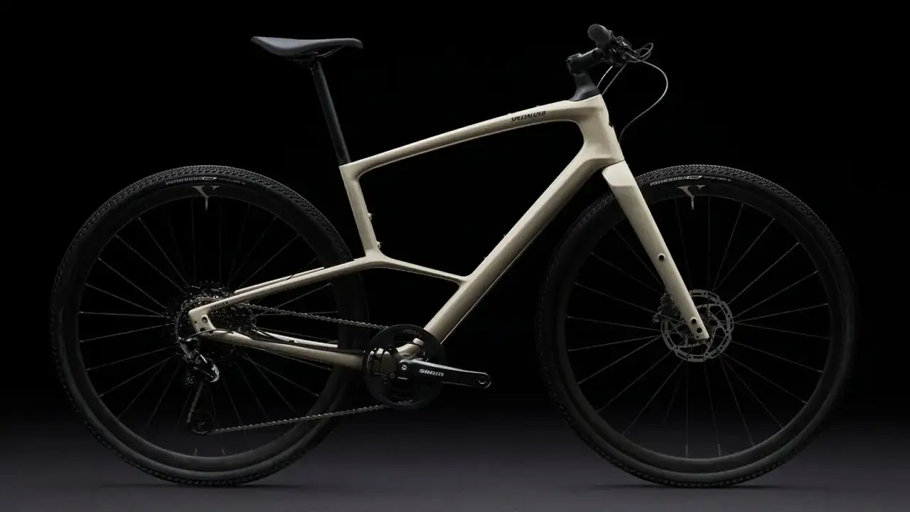 A modern, light beige Specialized bike with a unique frame design. Are specialized bikes good? This one looks like it's built for speed and style.