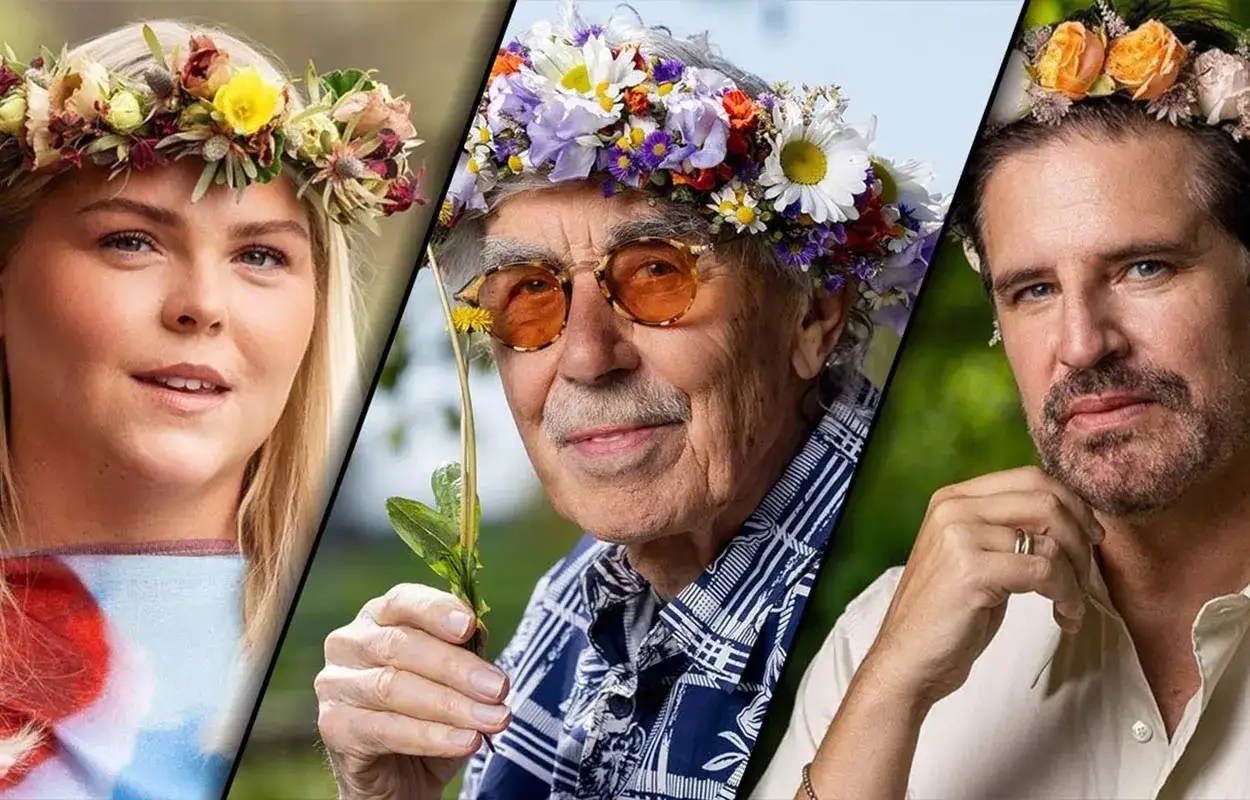 Tre personer med blomsterkransar på huvudet, kanske årets sommarpratare. En kvinna, en äldre man med glasögon och en man med skägg.