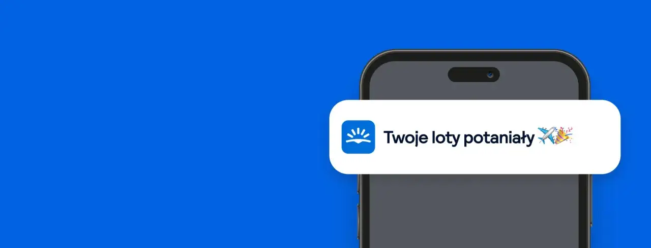 Tanie loty z Krakowa gdziekolwiek! Powiadomienie na telefonie informuje o obniżce cen biletów lotniczych.