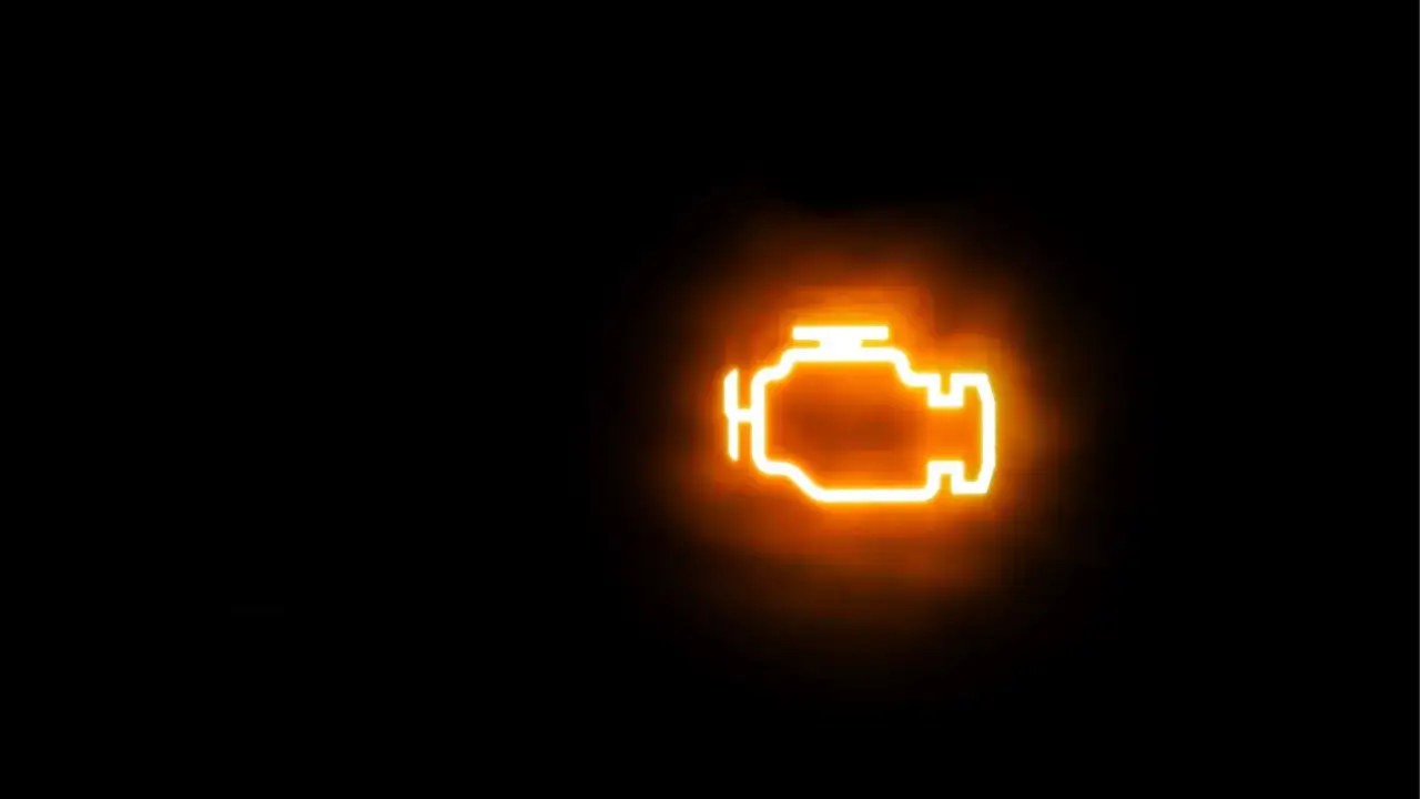 Icona luminosa arancione di un motore, la spia motore gialla fissa indica un problema.