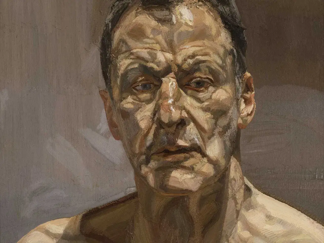 Retrato de un hombre con piel curtida, capturado con la intensidad característica de Lucian Freud.