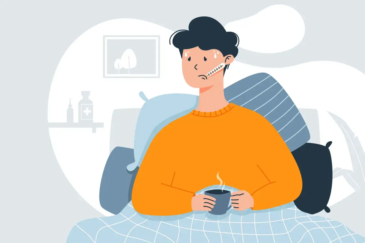 En person med feber och termometer i munnen ligger i sängen med en kopp varm dryck. Kanske en illustration om sjukskrivning stress.