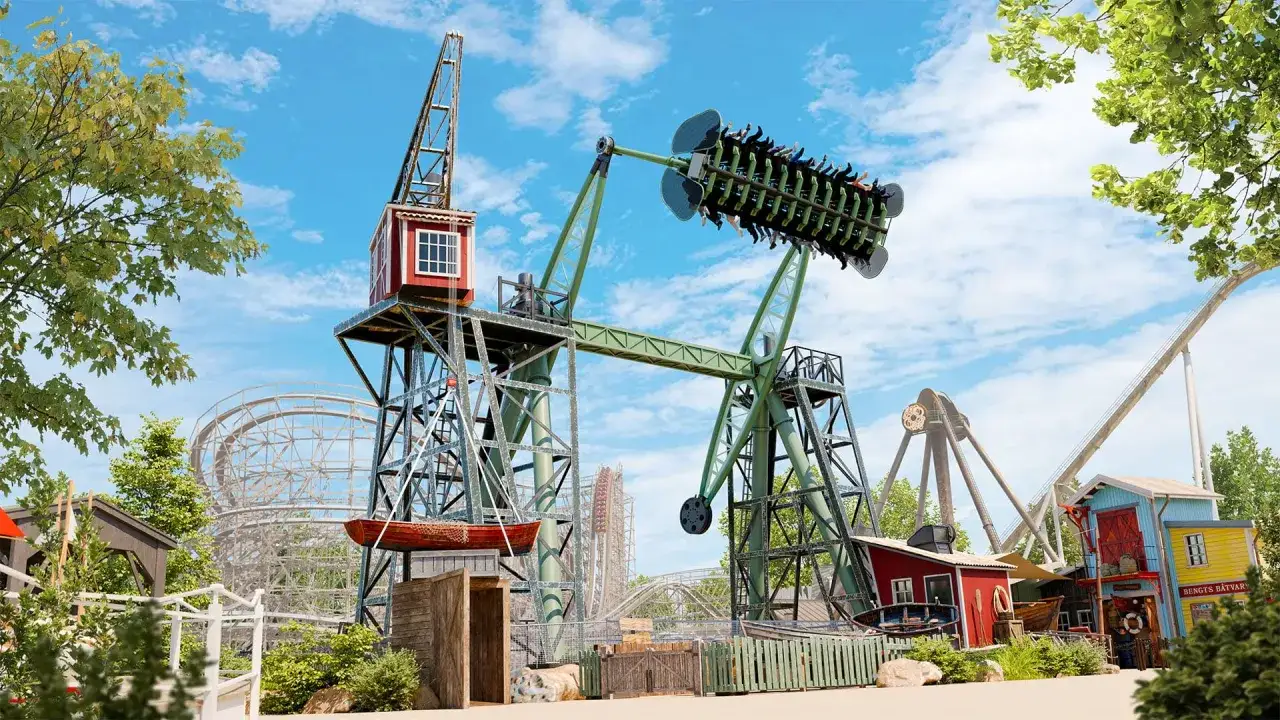 En berg-och-dalbana och en stor gungande attraktion i Liseberg park.