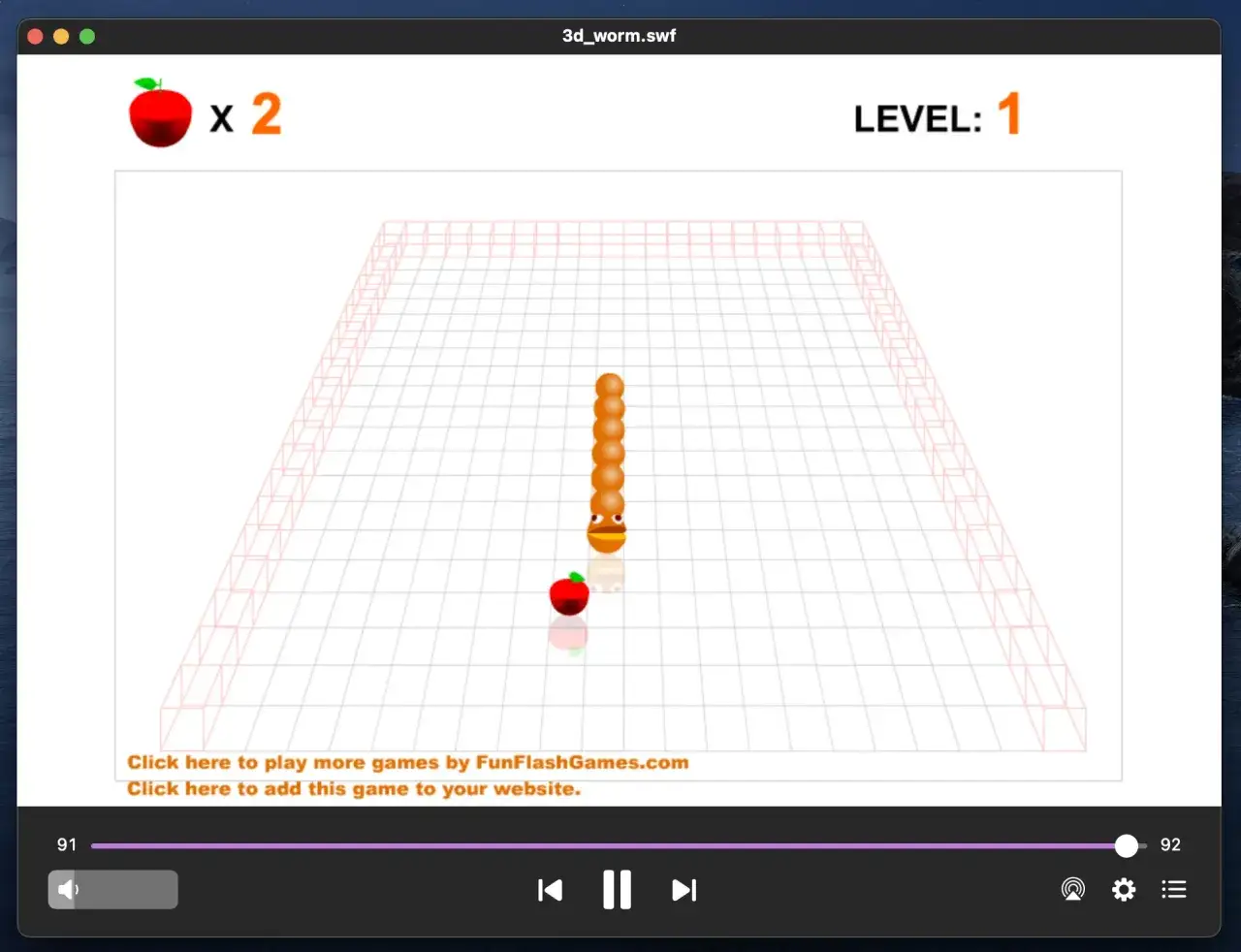 A 3D worm game, likely a .swf file for Mac, shows a segmented orange worm on a grid, aiming for an apple. Level 1, 2 apples collected.