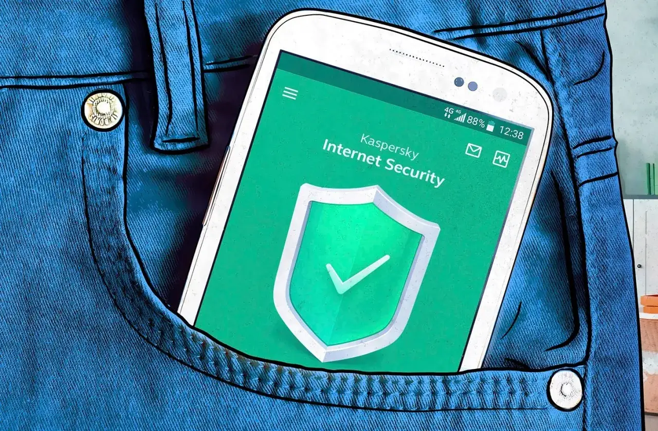 Telefon w kieszeni dżinsów z aplikacją Kaspersky Internet Security. Dowiedz się, jak usunąć wirusy z telefonu.