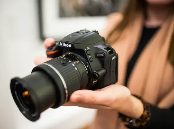 Nikon camera taking photo