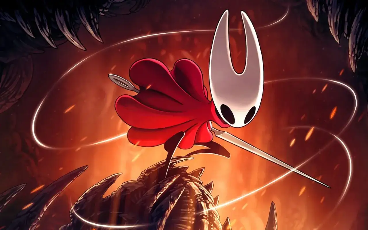 Hornet, con su capa roja y aguja, se prepara para la acción en un mundo ardiente, anticipando la aventura de Hollow Knight Silksong.