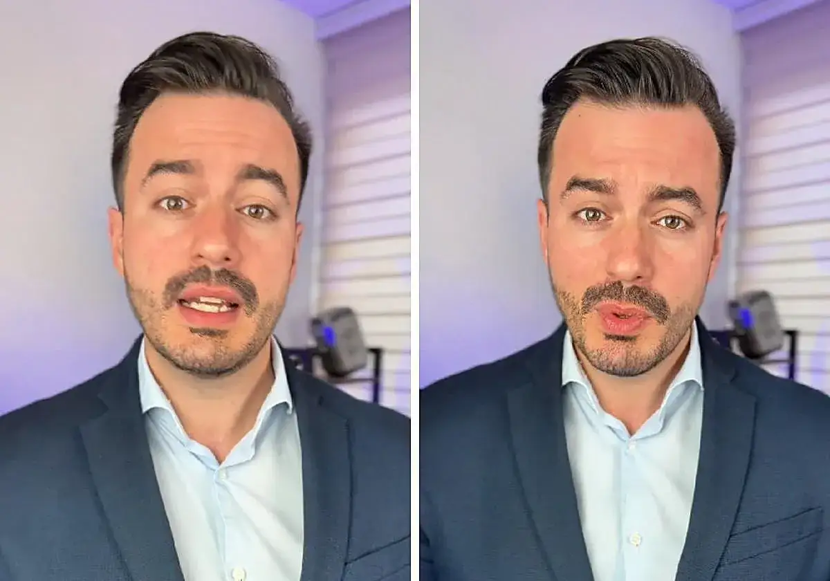 Hombre con traje azul, camisa clara, hablando. Podr&iacute;a estar desmintiendo mentiras en la carta de despido.