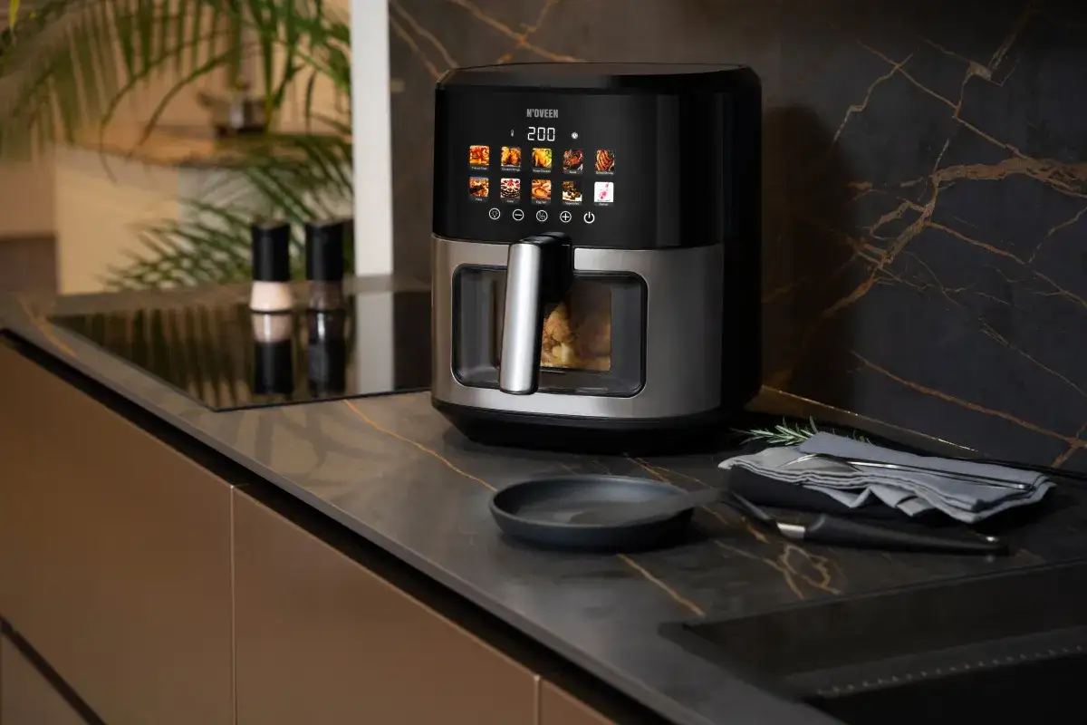 Nowoczesny air fryer z dotykowym ekranem, który pozwala przygotować pyszne i zdrowe potrawy. To najlepszy air fryer do Twojej kuchni.