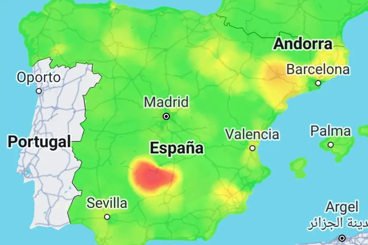 Mapa de España y Portugal con zonas de colores que indican el índice de calidad del aire. Destaca una zona roja en el sur de España.