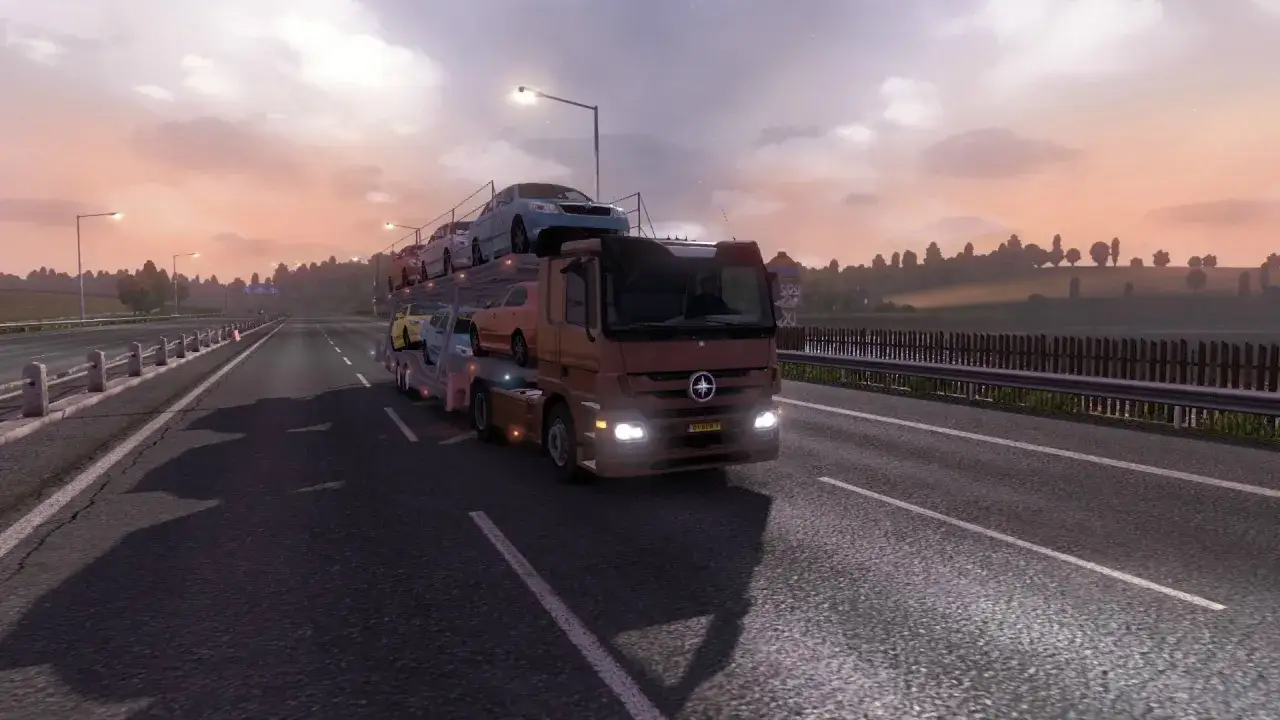 Ciężar&oacute;wka przewozi kilka samochod&oacute;w na autostradzie. Wspaniałe mody do ets2!