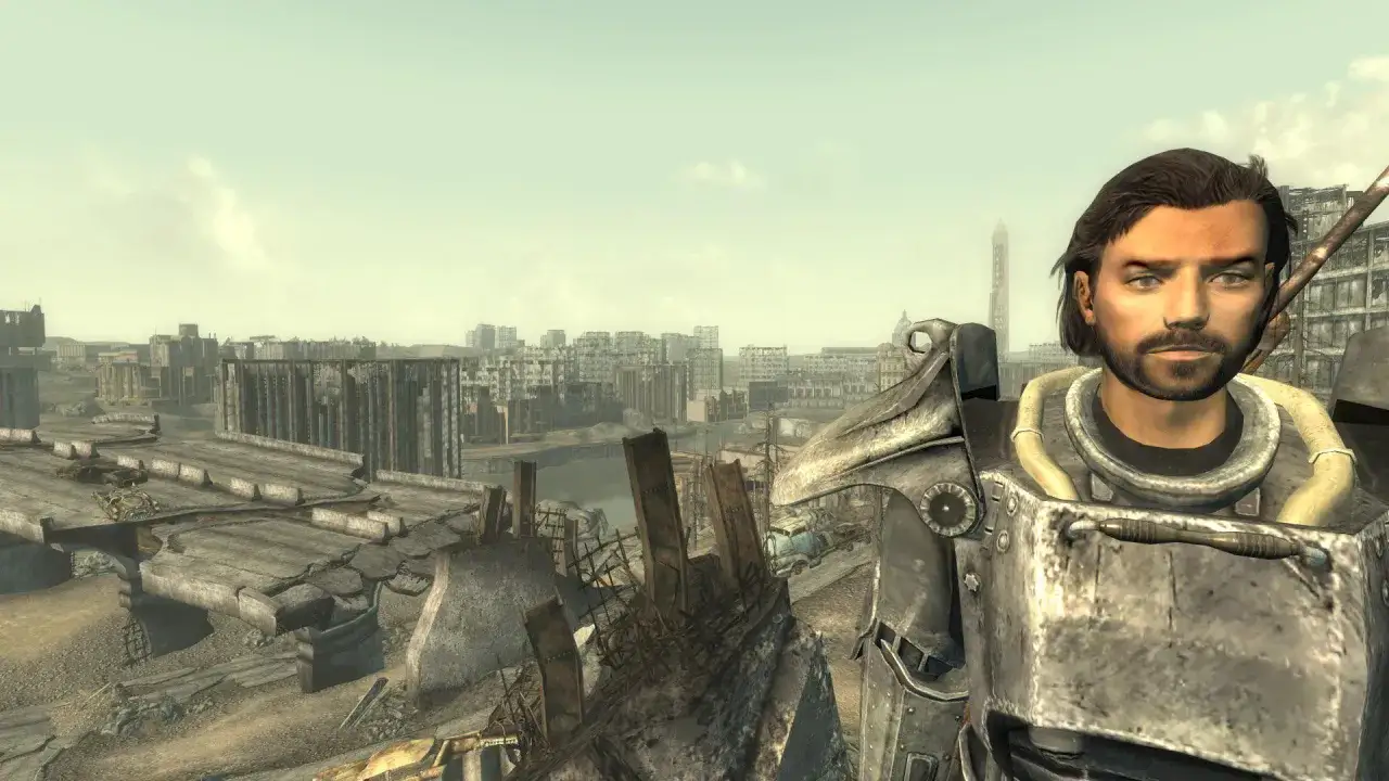 Un sopravvissuto in armatura atomica guarda la citt&agrave; distrutta in Fallout 3 Remastered.