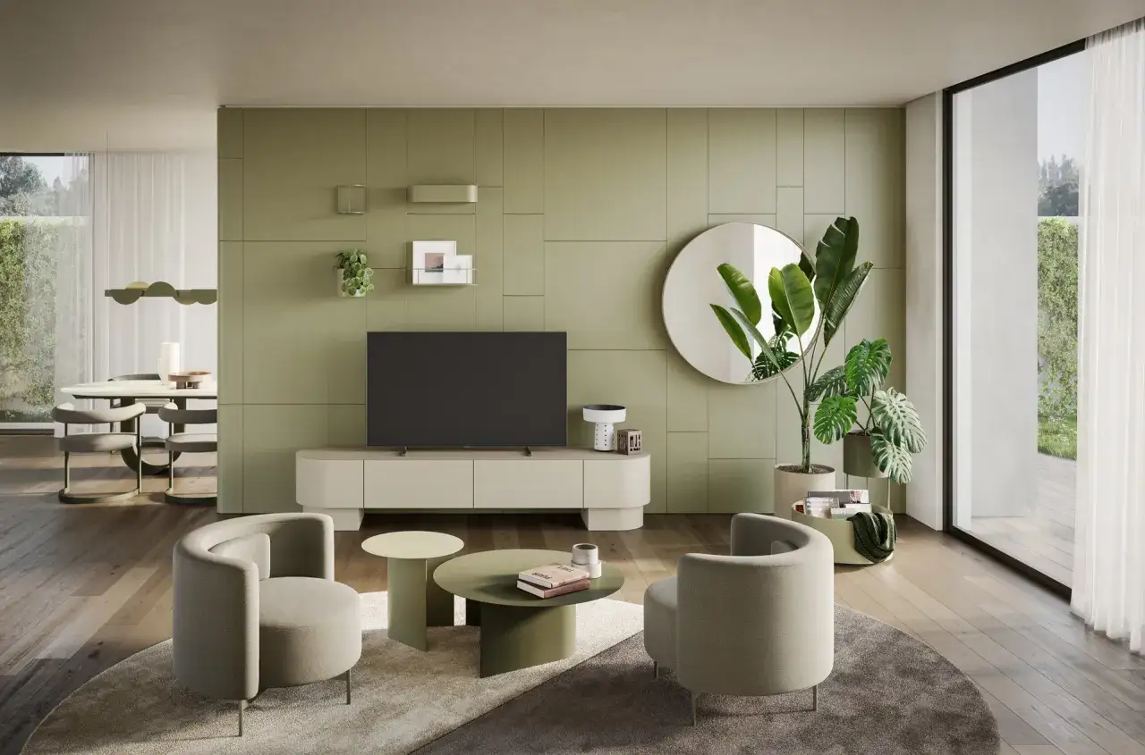 Soggiorno moderno con pareti color marrs green, divani accoglienti, tavolini rotondi e un grande specchio.
