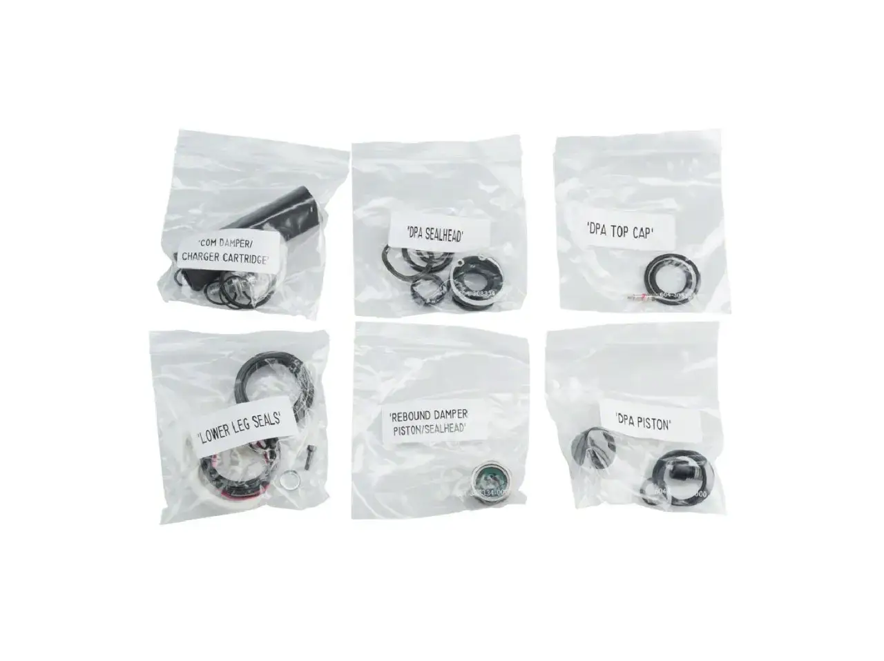 RockShox Pike oil volume service kit parts: damper cartridge, sealheads, top cap, lower leg seals, rebound piston/sealhead, and DPA piston.