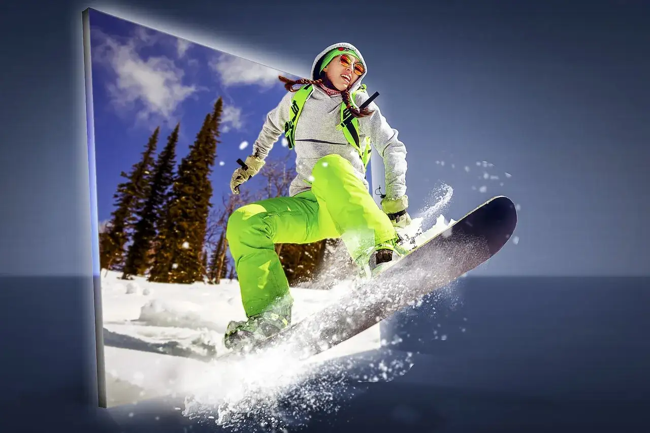 Snowboardzistka w jaskrawozielonych spodniach w locie. Sprawdź snowboarding terminarz i wyniki, by śledzić jej zmagania!