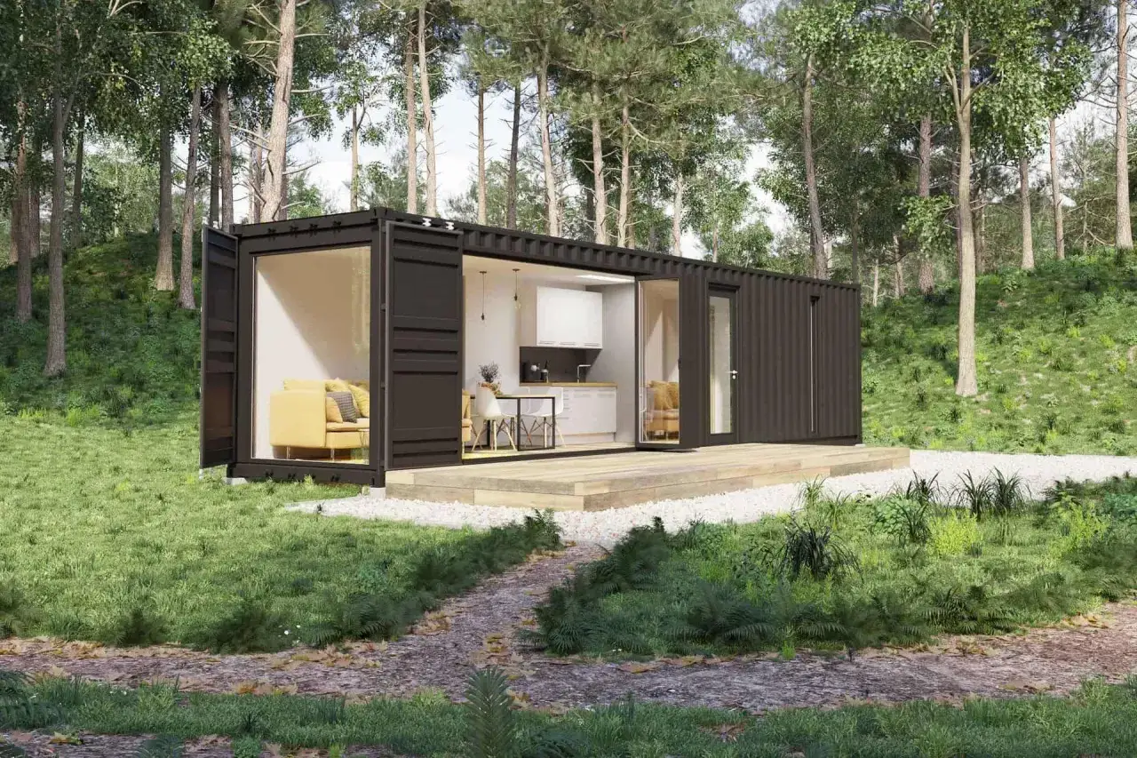 Modernes Container Haus im Wald. Einblick in Wohnbereich und K&uuml;che. Informieren Sie sich &uuml;ber die Container haus kosten f&uuml;r Ihr Traumhaus.