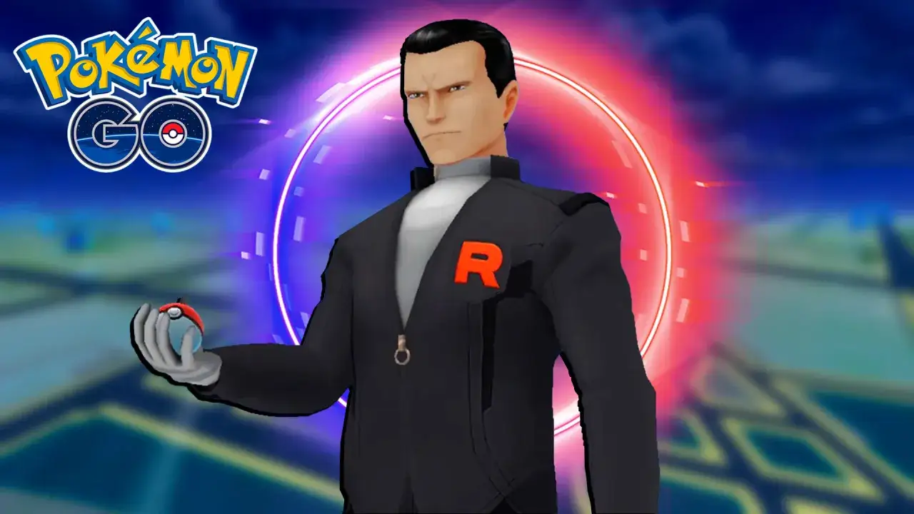 Giovanni de Pokémon GO, con su traje negro y el logo de R, sostiene una Poké Ball.
