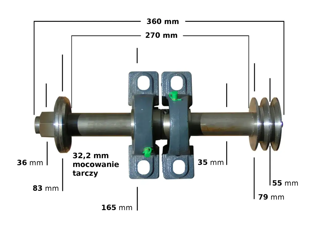 Wałek do krajzegi z łożyskami i kołami pasowymi. Wymiary: 360 mm, 270 mm, 32,2 mm mocowanie tarczy, 36 mm, 83 mm, 165 mm, 35 mm, 55 mm, 79 mm.