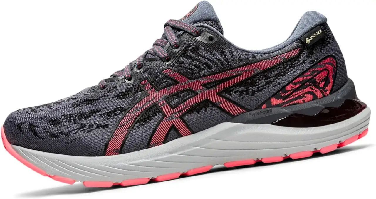 Scarpa da running Asics Gel Cumulus 23 grigia con dettagli fucsia e tecnologia Gore-Tex per affrontare ogni condizione.