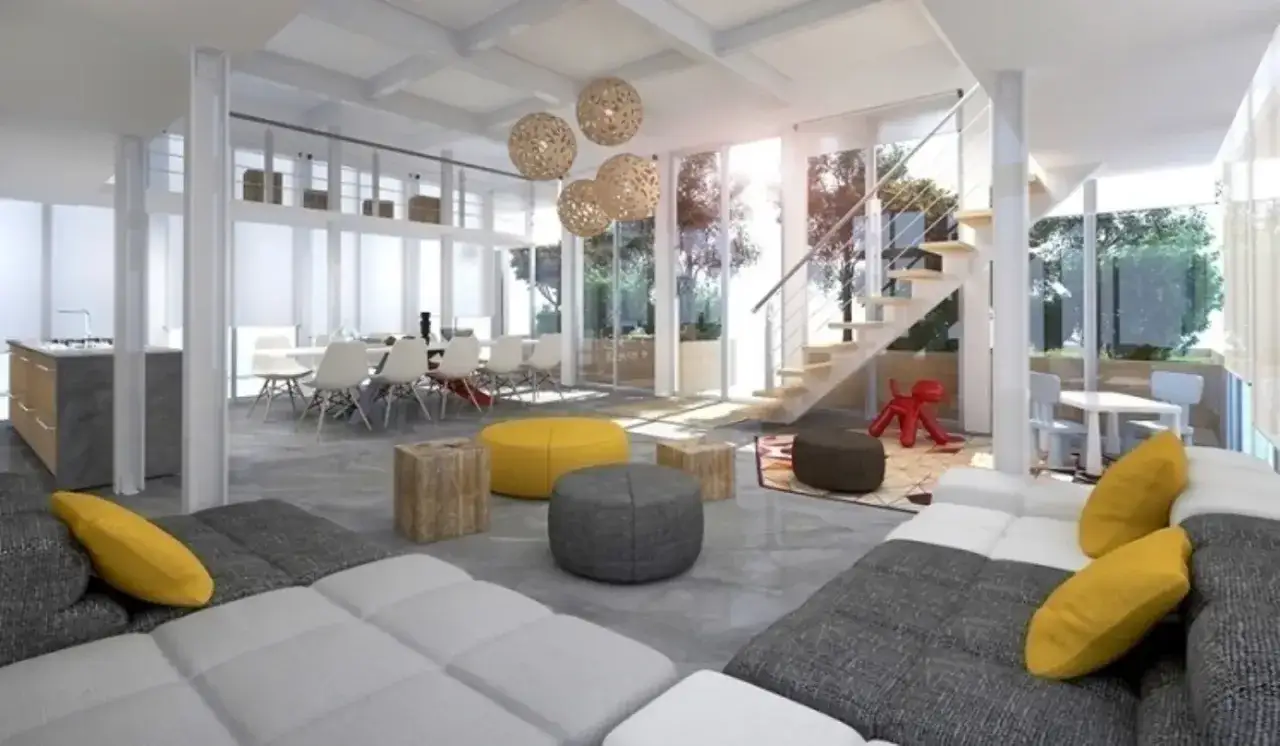 Interni luminosi con cucina, sala da pranzo e zona relax. Esempi di cohousing con arredi moderni e ampie vetrate.