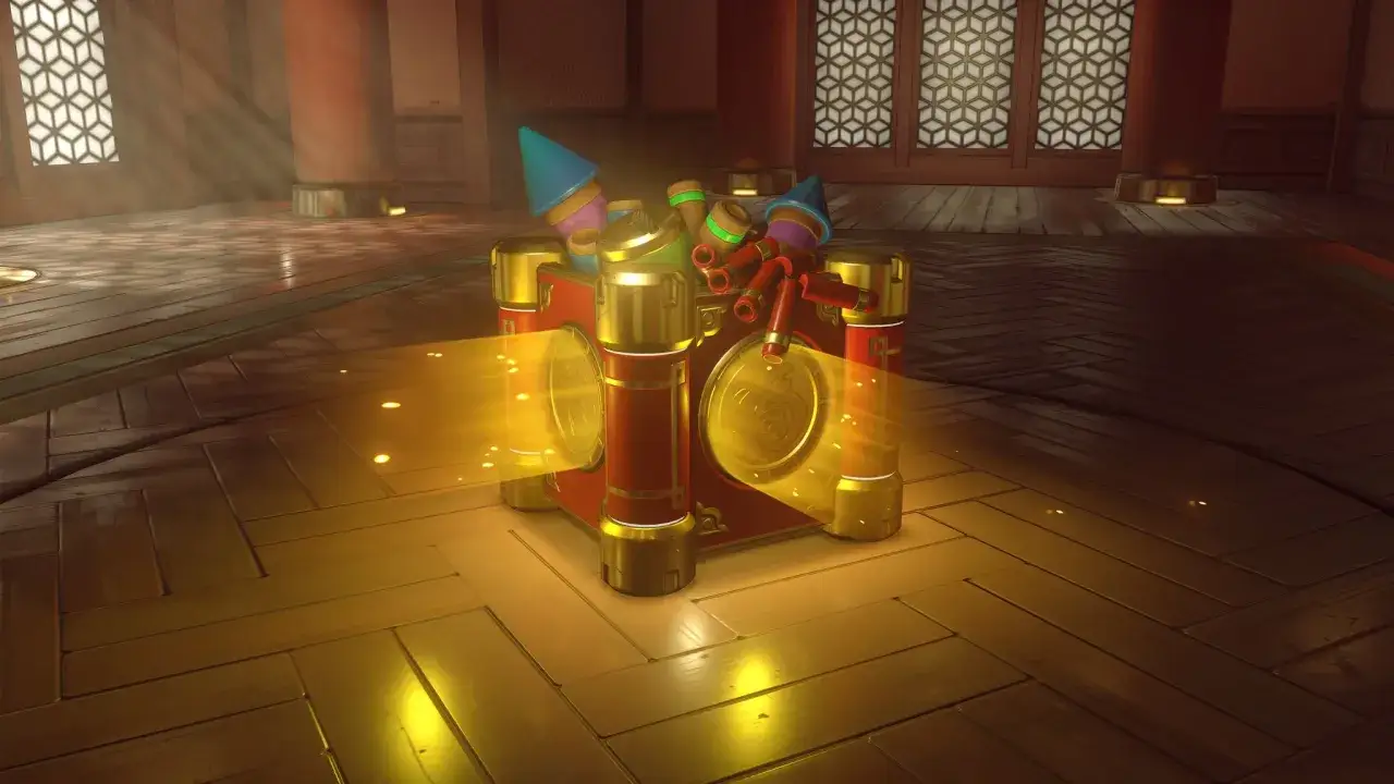 Czerwono-złoty loot box z fajerwerkami i stożkami na głowę, emanujący magicznym blaskiem.
