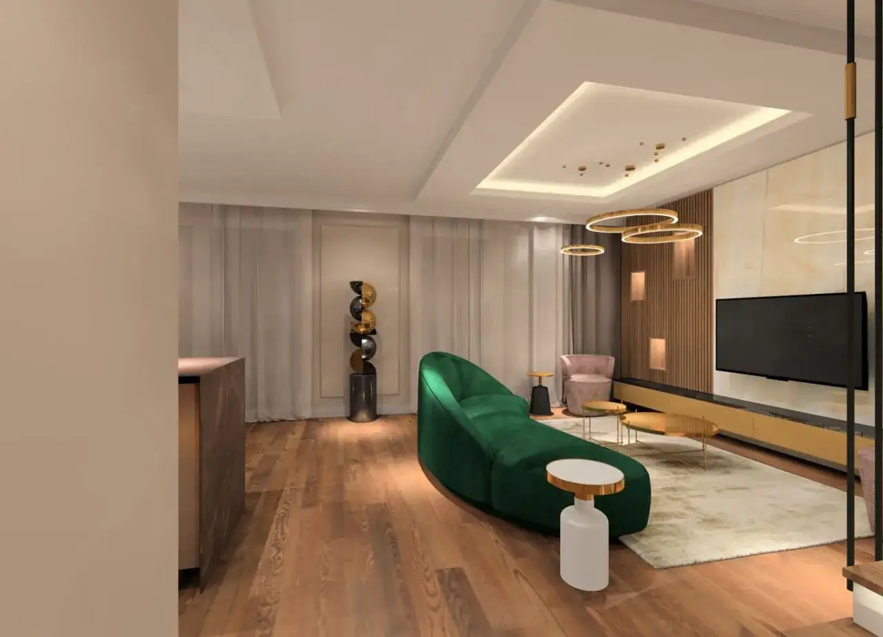 Nowoczesny salon z sofą w kształcie fali i **oliwkowym kolorem ścian**. Drewniana podłoga, złote dodatki i designerskie oświetlenie tworzą elegancką przestrzeń.