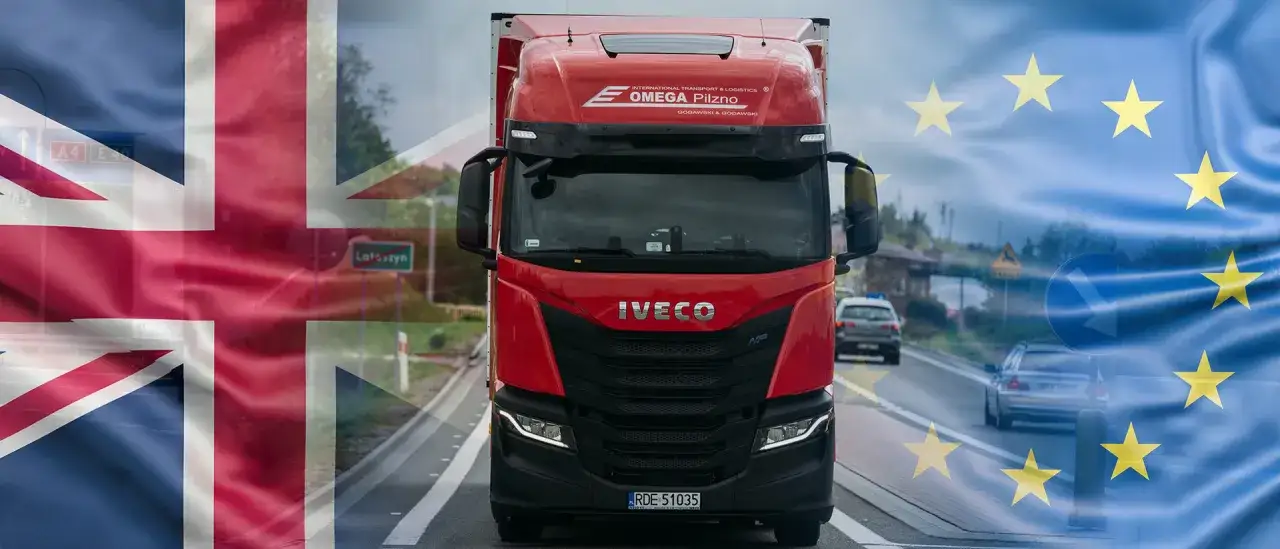 Czerwona ciężarówka Iveco, symbol transportu międzynarodowego. GMR co to jest? To firma OMEGA Pilzno, łącząca Wielką Brytanię i UE.