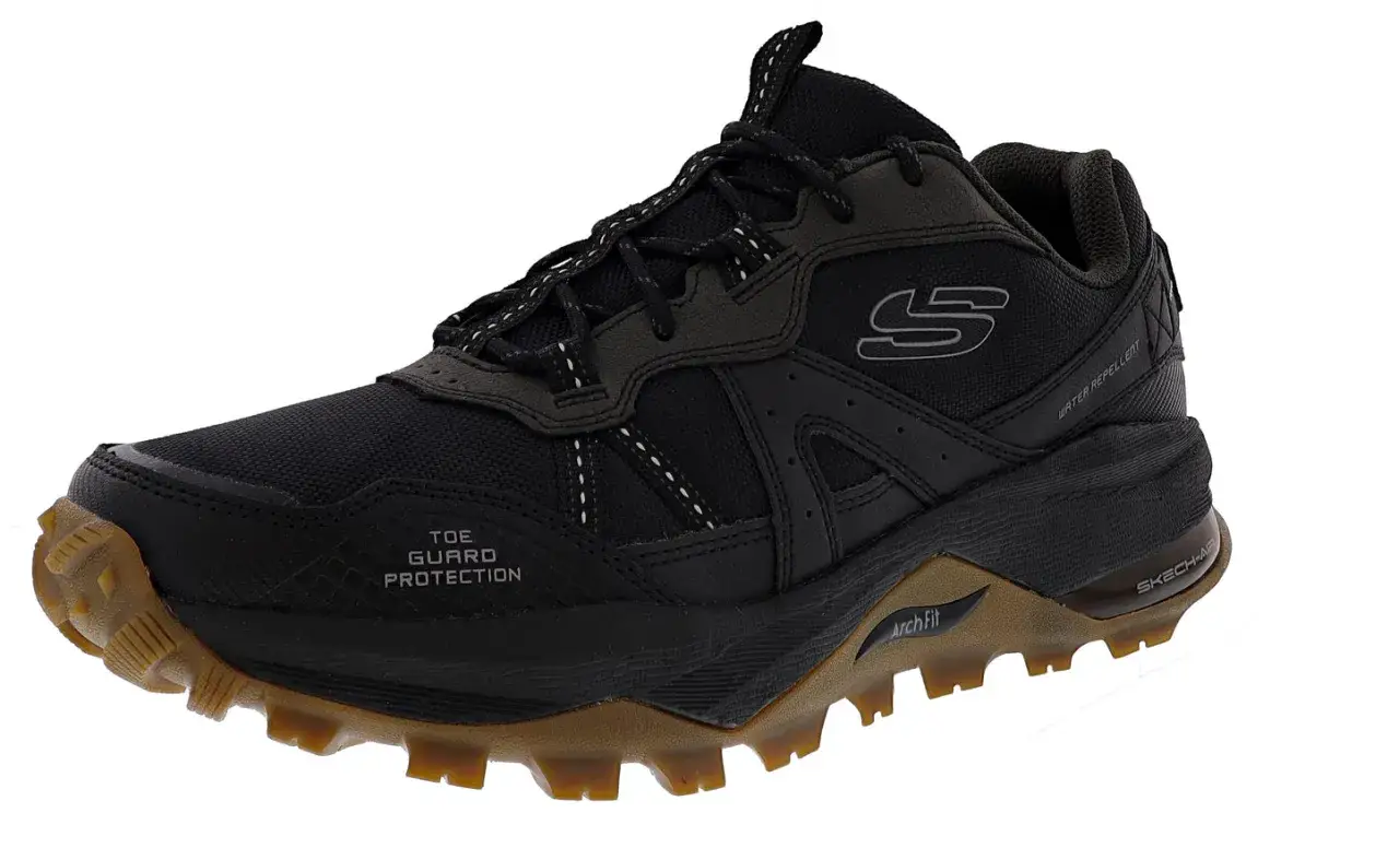 Zapatilla Skechers Arch Fit 2.0 negra, con protecci&oacute;n en la puntera y suela de tracci&oacute;n. Perfecta para tus aventuras.