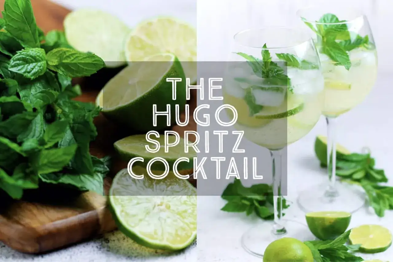 Erfrischender Hugo Spritz mit frischer Minze und Limettenscheiben. Perfekt für heiße Tage.