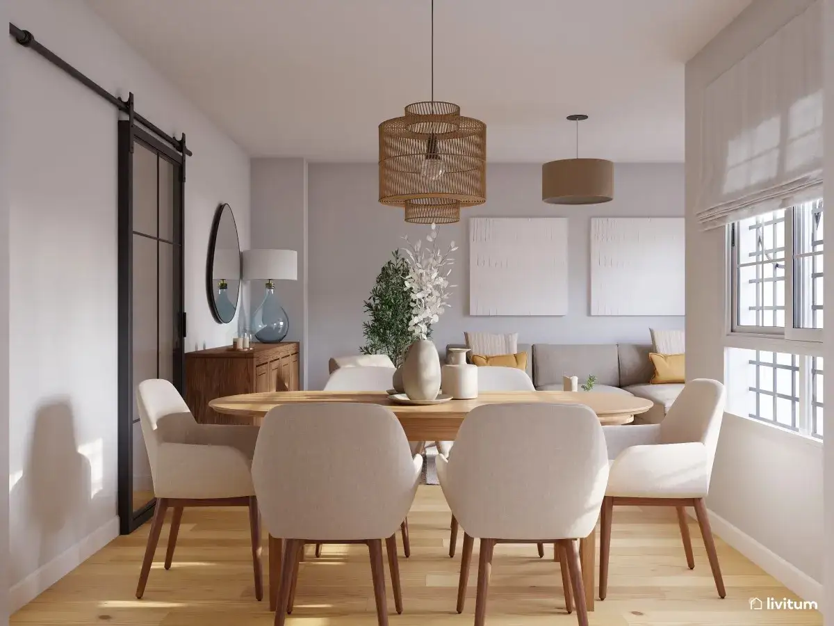 Comedor moderno con mesa ovalada, sillas tapizadas y una lámpara colgante de dos luces de mimbre.