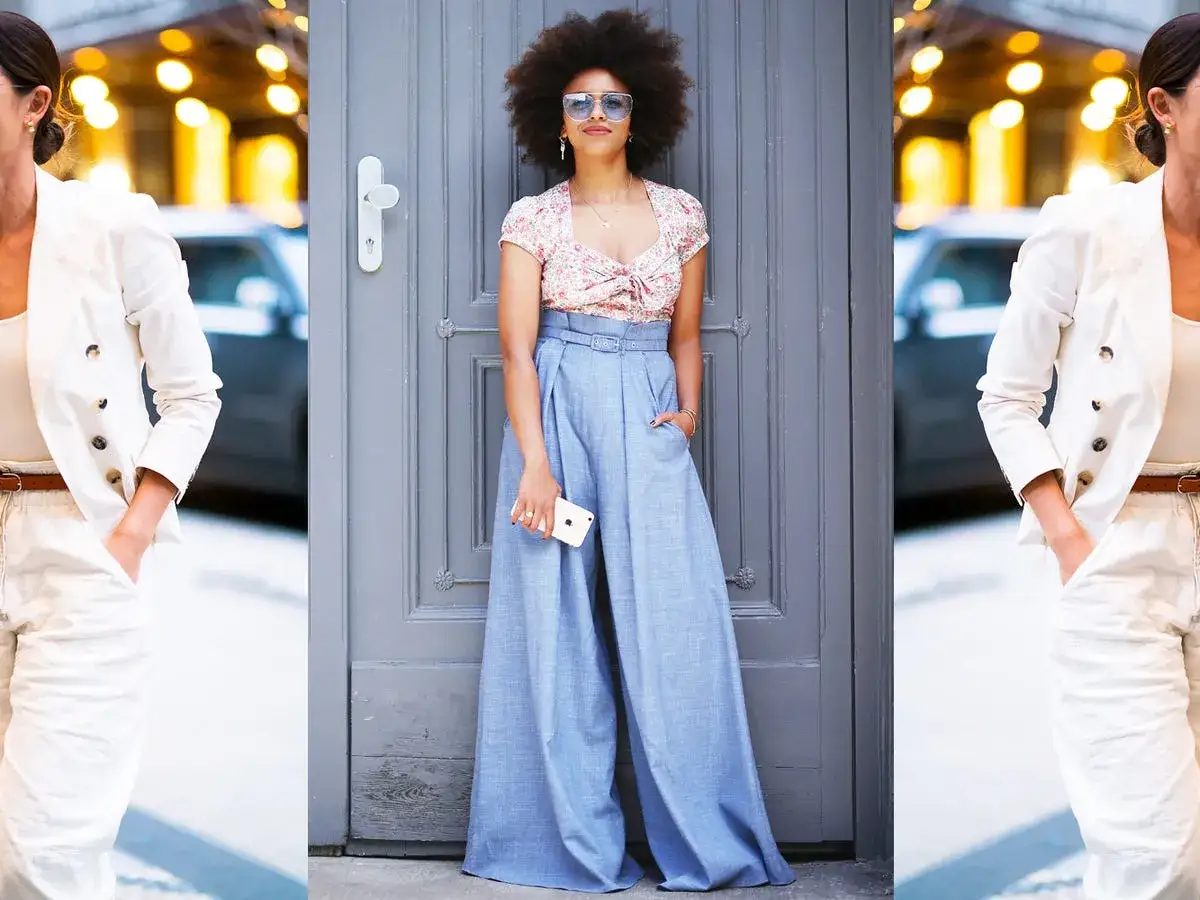 Moda: pantaloni high waist significato. Due donne con outfit eleganti, una con pantaloni a vita alta blu e crop top floreale, l'altra con completo bianco.