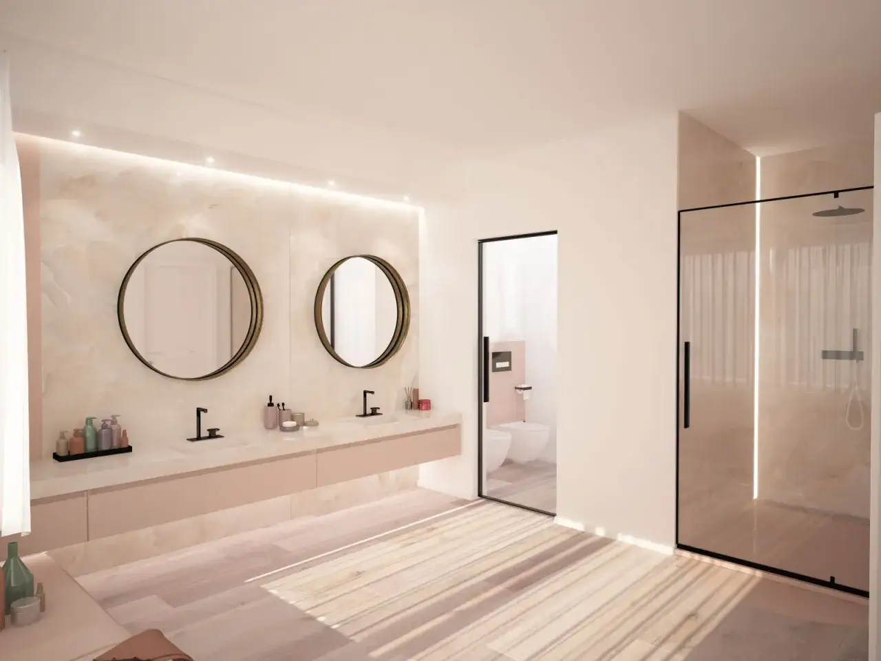 Eleganti idee bagno rosa con doppio lavabo, specchi rotondi e doccia in vetro. Un tocco di colore delicato per un ambiente rilassante.