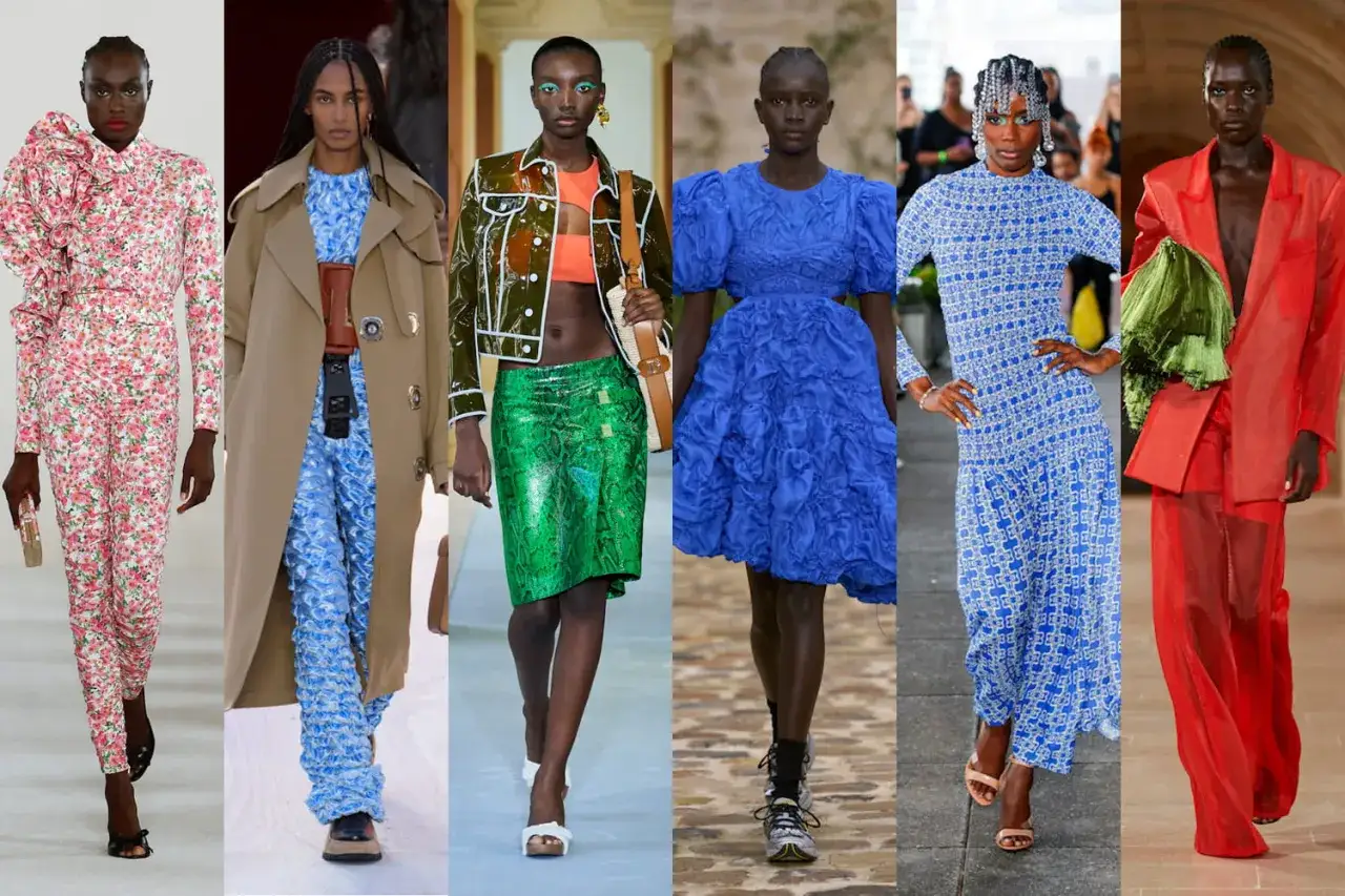 Mannequins arborent des tenues vibrantes, un défilé de mode qui capture la couleur de l'été avec des imprimés floraux, du bleu électrique, du vert serpent et du rouge audacieux.