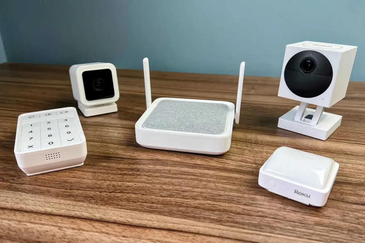 Home network security monitoring setup: a router, keypad, two cameras, and a light.