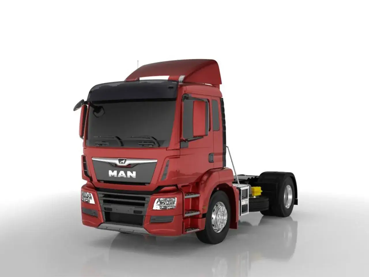 Un camion cabine rouge MAN, pr&ecirc;t &agrave; tracter une remorque.