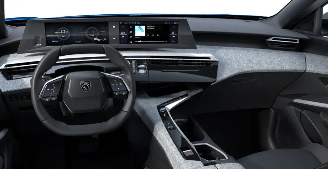 Nowoczesne wnętrze Peugeot 3008 z cyfrowymi zegarami i ekranem multimediów. Sprawdź aktualną peugeot 3008 cena!