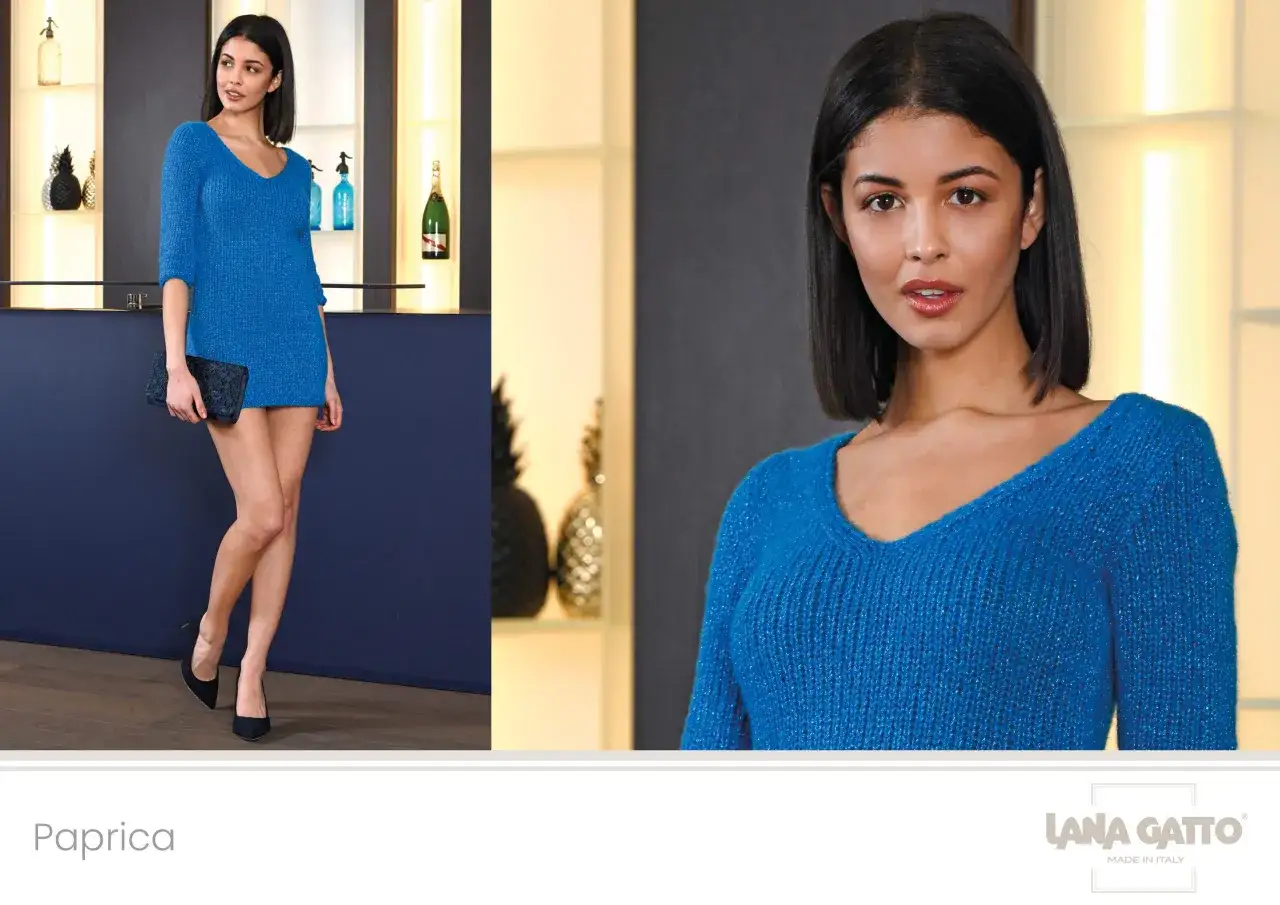 Modella con abito blu elettrico, un capo tinta unita significato di eleganza e stile, abbinato a una clutch nera.