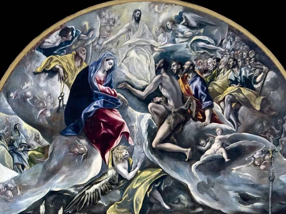 El museo del Greco exhibe esta obra celestial: la Virgen María, San Juan Bautista y apóstoles en gloria, con Cristo en el centro.